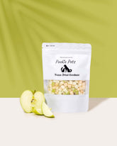 Pouch of Pookie Pets freeze-dried pet food with apple slices on a light green background